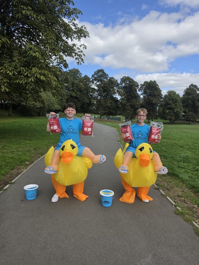 Fundraisers in duck costumes at Stevens Park, Quarry Bank, with bleed control kits
